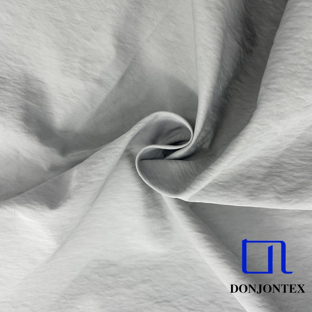 Hot Sale 390T Nylon Taslon Taslan Twill Fabric with Breathable and Waterproof for Outdoor Windproof Jackets