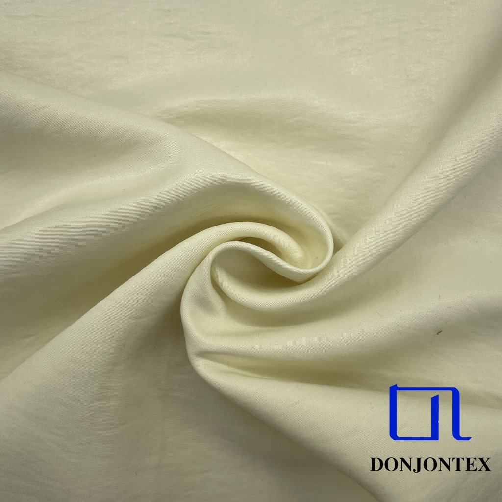 2025 New Design Polyester Rayon Imitation Cuprammonium Woven Fabric Soft Plain Crepe Dyed for Girls' Dresses T-Shirts Suits