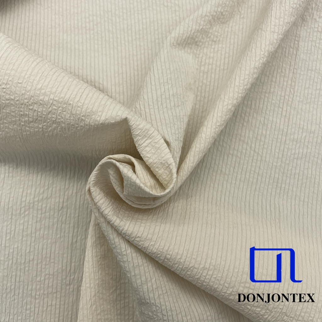 High Quality Oeko-tex Standard 100% Polyester Cotton-Like Fabric with Bubble Check Pattern for Women and Men Outer Coats