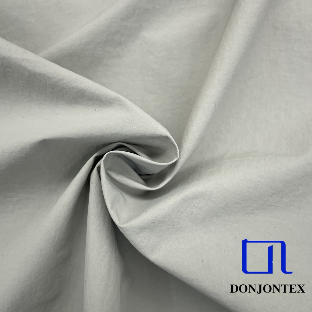 Hot Sale 100% Recycled Full Dull Nylon Taslon Fabric with Solid Color for Outdoor Garment and Pants