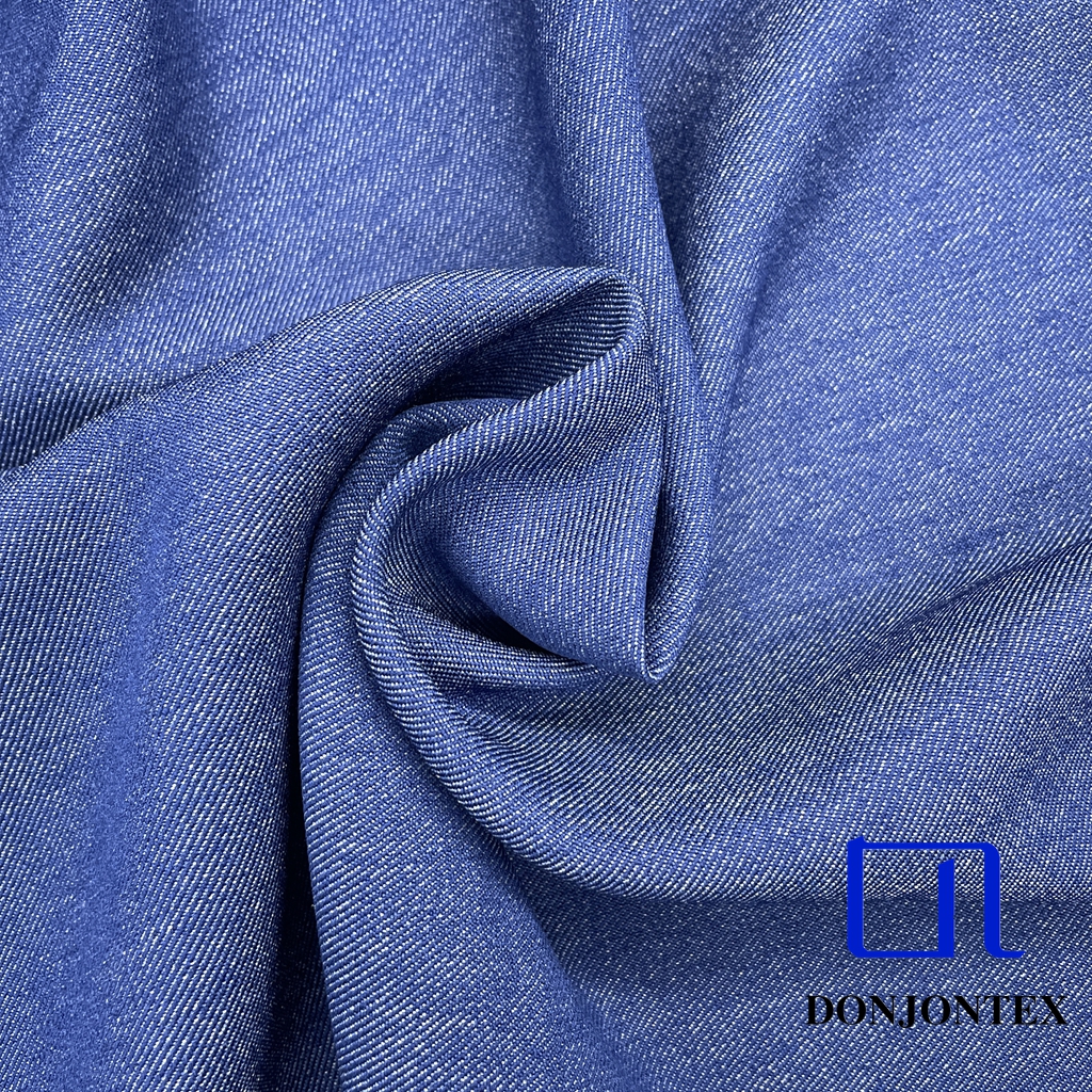Wholesale 100% Polyester Faux Denim Fabric with Soft Touch and High Color Fastness for Pants and Outer Coats